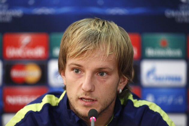 Barcelona's Ivan Rakitic speaks during a press conference before a training session at GSP stadium, Monday, Nov. 24, 2014. Barcelona will play on tomorrow against Apoel in a Champions League soccer match. (AP Photo/Petros Karadjias)