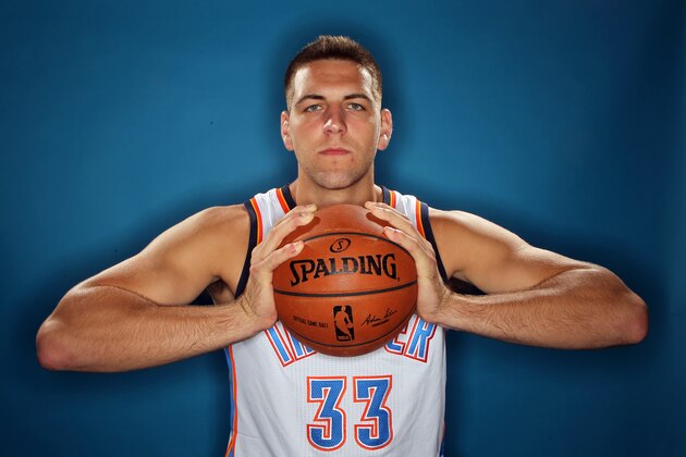 OKLAHOMA CITY, OK - SEPTEMBER 29:  Oklahoma City Thunder Mitch McGary #33 poses for a portrait during 2014 NBA Media Day on September 29, 2014 at the Thunder Events Center in Edmond, Oklahoma. NOTE TO USER: User expressly acknowledges and agrees that, by downloading and or using this Photograph, user is consenting to the terms and conditions of the Getty Images License Agreement. Mandatory Copyright Notice: Copyright 2014 NBAE (Photo by Layne Murdoch/NBAE via Getty Images)