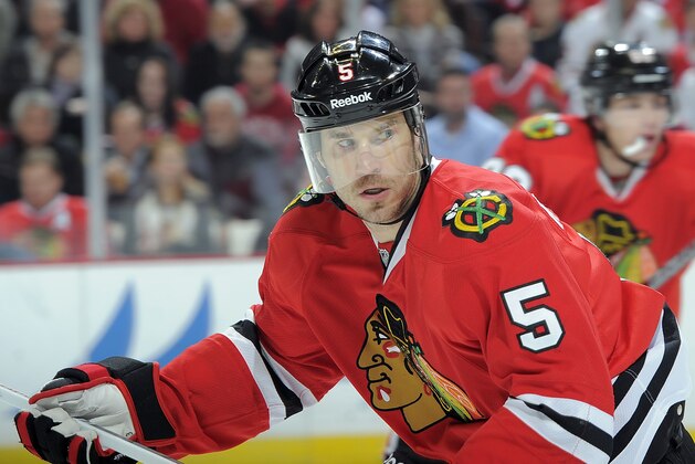 CHICAGO, IL- DECEMBER 30:  Steve Montador #5 of the Chicago Blackhawks watches for the puck during the NHL game against the Detroit Red Wings on December 30, 2011 at the United Center in Chicago, Illinois. (Photo by Bill Smith/NHLI via Getty Images)