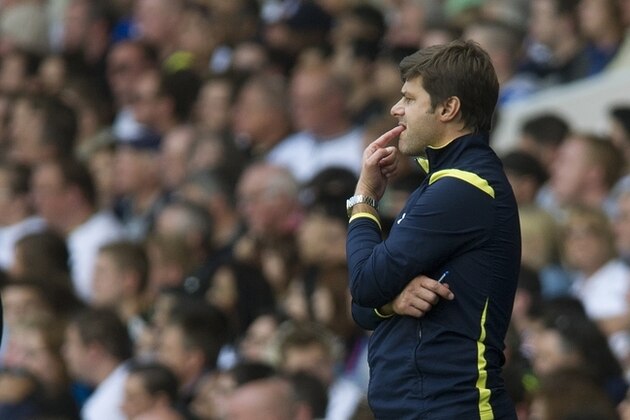 Tottenham Hotspur's manager Mauricio Pochettino looks on, during their English Premier League soccer match against  Liverpool, at White Hart Lane, London, Sunday, Aug. 31, 2014 (AP Photo/Bogdan Maran)