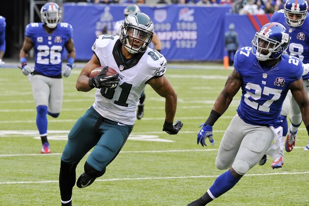 Philadelphia Eagles' Jordan Matthews (81) runs past New York Giants' Stevie Brown (27) for a touchdown during the first half of an NFL football game Sunday, Dec. 28, 2014, in East Rutherford, N.J. (AP Photo/Bill Kostroun)