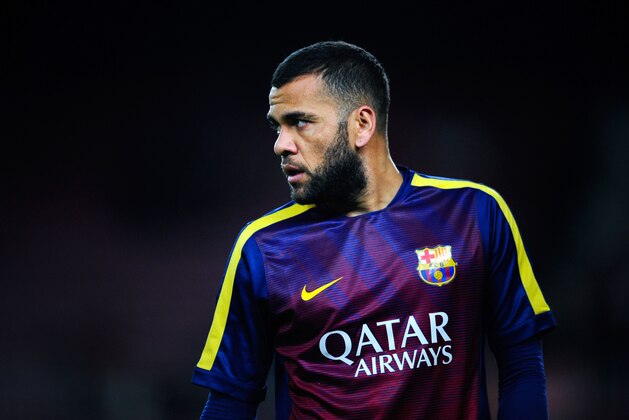 BARCELONA, SPAIN - FEBRUARY 11:  Dani Alves of FC Barcelona looks on during the warm up prior to the Copa del Rey Semi-Final first leg match between FC Barcelona and Villarreal CF at Camp Nou on February 11, 2015 in Barcelona, Spain.  (Photo by David Ramos/Getty Images)