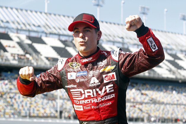 Feb 15, 2015; Daytona Beach, FL, USA; NASCAR Sprint Cup Series driver Jeff Gordon (24) celebrates winning the pole during qualifying for the Daytona 500 at Daytona International Speedway. Mandatory Credit: Peter Casey-USA TODAY Sports