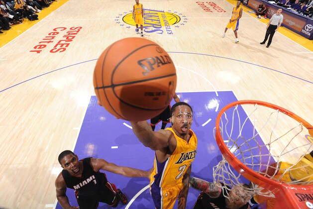 LOS ANGELES, CA - JANUARY 13: Ed Davis #21 of the Los Angeles Lakers shoots against the Miami Heat on January 13, 2015 in Los Angeles, California. NOTE TO USER: User expressly acknowledges and agrees that, by downloading and/or using this Photograph, user is consenting to the terms and conditions of the Getty Images License Agreement. Mandatory Copyright Notice: Copyright 2015 NBAE (Photo by Andrew D. Bernstein/NBAE via Getty Images)