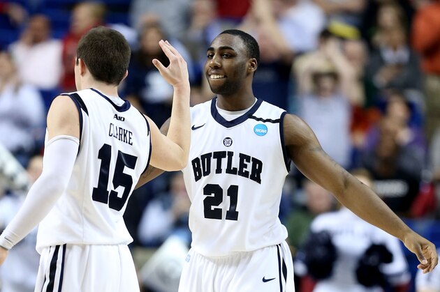 LEXINGTON, KY - MARCH 21:  Rotnei Clarke #15 and Roosevelt Jones #21 of the Butler Bulldogs show camaraderie in the second half against the Bucknell Bison during the second round of the 2013 NCAA Men's Basketball Tournament at the Rupp Arena on March 21, 2013 in Lexington, Kentucky. Butler won 68-56.  (Photo by Andy Lyons/Getty Images)