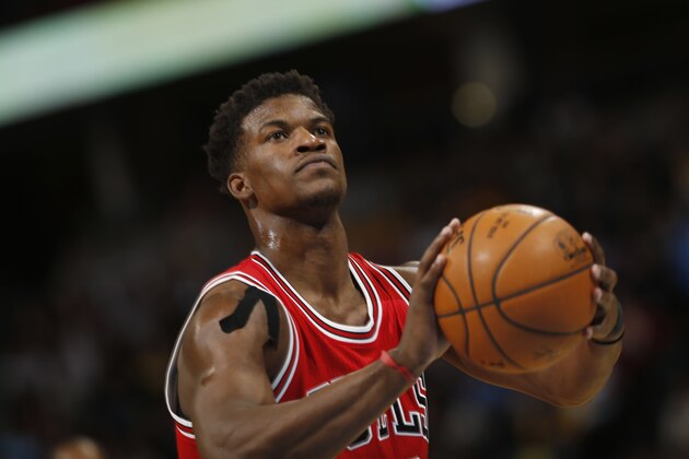 Chicago Bulls forward Jimmy Butler takes a free throw shot against the Denver Nuggets in the first quarter of an NBA basketball game in Denver on Tuesday, Nov. 25, 2014. (AP Photo/David Zalubowski) Chicago Bulls forward Jimmy Butler takes a free throw shot against the Denver Nuggets in the first quarter of an NBA basketball game in Denver on Tuesday, Nov. 25, 2014. (AP Photo/David Zalubowski)