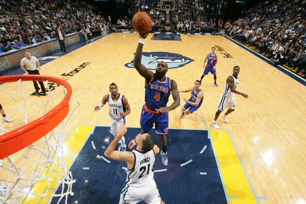 MEMPHIS, TN - JANUARY 5: Quincy Acy #4 of the New York Knicks shoots against the Memphis Grizzlies on January 5, 2015 at FedExForum in Memphis, Tennessee. NOTE TO USER: User expressly acknowledges and agrees that, by downloading and or using this photograph, User is consenting to the terms and conditions of the Getty Images License Agreement. Mandatory Copyright Notice: Copyright 2015 NBAE (Photo by Joe Murphy/NBAE via Getty Images)