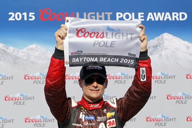 Feb 15, 2015; Daytona Beach, FL, USA; NASCAR Sprint Cup Series driver Jeff Gordon (24) celebrates winning the pole during qualifying for the Daytona 500 at Daytona International Speedway. Mandatory Credit: Peter Casey-USA TODAY Sports