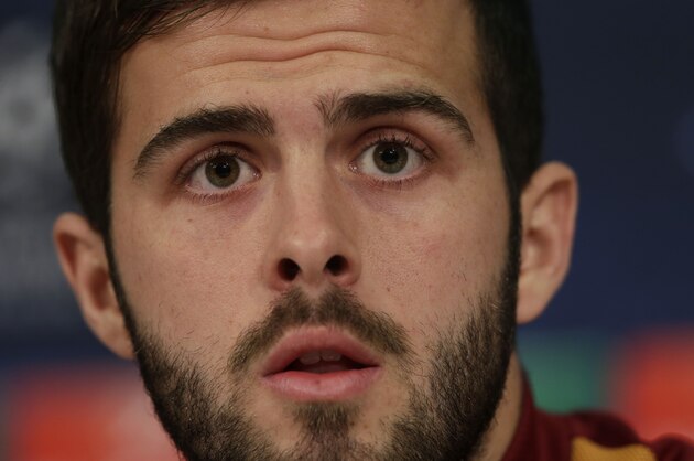 Roma's Miralem Pjanic attends a news conference prior to the Champions League Group E soccer match between FC Bayern Munich and AS Roma at Allianz Arena in Munich, southern Germany, Tuesday Nov. 4, 2014. Bayern Munich will face Roma on Wednesday. (AP Photo/Matthias Schrader)