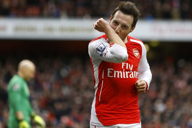 Arsenal's  Santi Cazorla celebrates scoring a goal during the English Premier League soccer match between Arsenal and Aston Villa at the Emirates stadium in London, Sunday, Feb. 1, 2015. (AP Photo/Kirsty Wigglesworth)