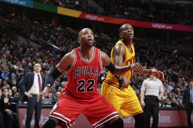 CHICAGO, IL - FEBRUARY 12:  Taj Gibson #22 of the Chicago Bulls boxes out against James Jones #1 of the Cleveland Cavaliers during the game on February 12, 2015 at the United Center in Chicago, Illinois. NOTE TO USER: User expressly acknowledges and agrees that, by downloading and or using this Photograph, user is consenting to the terms and conditions of the Getty Images License Agreement. Mandatory Copyright Notice: Copyright 2015 NBAE (Photo by Jeff Haynes/NBAE via Getty Images)