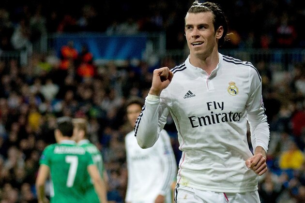 MADRID, SPAIN - DECEMBER 09:  Gareth Bale of Real Madrid CF celebrates scoring their second goal during the UEFA Champions League Group B match between Real Madrid CF and PFC Ludogorets Razgrad at Estadio Santiago Bernabeu on December 9, 2014 in Madrid, Spain.  (Photo by Gonzalo Arroyo Moreno/Getty Images)