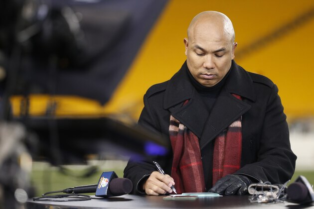 Former Pittsburgh Steelers Hines Ward and broadcaster prepares before an NFL football game between the Pittsburgh Steelers and the Cincinnati Bengals, Sunday, Dec. 28, 2014 in Pittsburgh. (AP Photo/Gene J. Puskar)