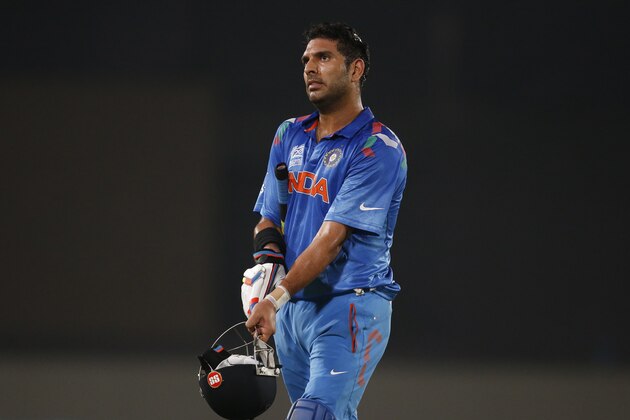 India's batsman Yuvraj Singh leaves the ground after losing his wicket during their ICC Twenty20 Cricket World Cup semi-final match against South Africa in Dhaka, Bangladesh, Friday, April 4, 2014. (AP Photo/Aijaz Rahi)