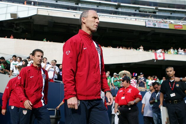 CHICAGO - JUNE 21:  Head coach Bob Bradley of USA walks onto the pitch against Canada during the CONCACAF Gold Cup Semifinal match at Soldier Field on June 21, 2007 in Chicago, Illinois.  (Photo by Jonathan Daniel/Getty Images)