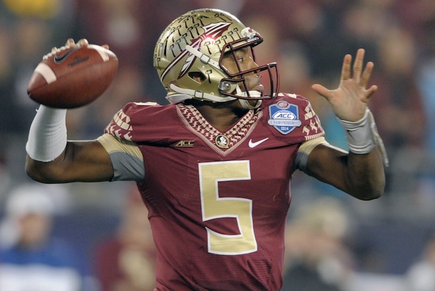 Florida State quarterback Jameis Winston (5) looks to pass against Georgia Tech during the first half of the Atlantic Coast Conference championship NCAA college football game in Charlotte, N.C., Saturday, Dec. 6, 2014. (AP Photo/Mike McCarn)