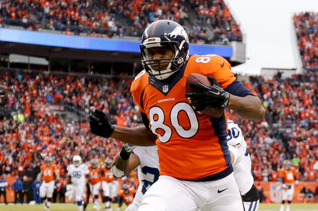Denver Broncos tight end Julius Thomas is knocked out of bounds just short of the goal line against the Indianapolis Colts during the first half of an NFL divisional playoff football game, Sunday, Jan. 11, 2015, in Denver. (AP Photo/Jack Dempsey)