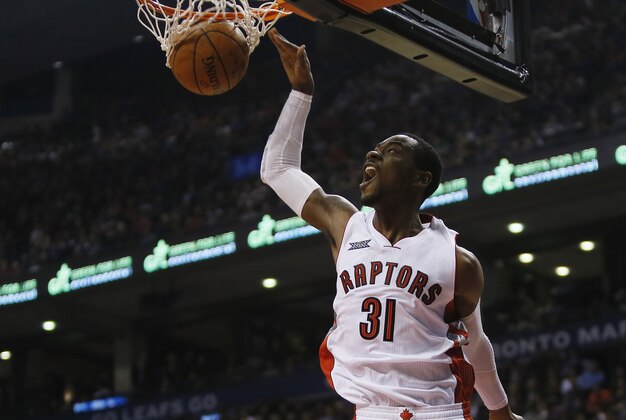 Dec 21, 2014; Toronto, Ontario, CAN; Toronto Raptors forward Terrence Ross (31) dunks the ball against the New York Knicks during the first half at the Air Canada Centre. Mandatory Credit: John E. Sokolowski-USA TODAY Sports