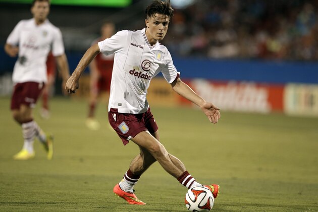 Aston Villa forward Jack Grealish controls the ball against FC Dallas during an international friendly soccer match, Wednesday, July 23, 2014, in Frisco, Texas. (AP Photo/Tony Gutierrez)