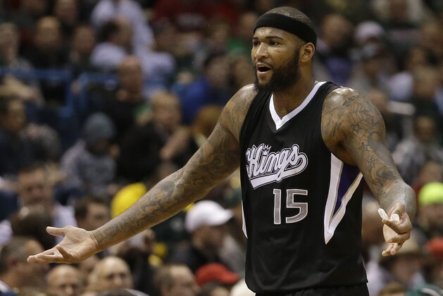 Sacramento Kings' DeMarcus Cousins reacts as he walks to the bench during an NBA basketball game against the Sacramento Kings Wednesday, Feb. 11, 2015, in Milwaukee. (AP Photo/Aaron Gash)
