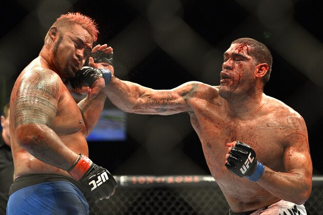 BRISBANE, AUSTRALIA - DECEMBER 07:  Antonio 'Big Foot' Silva of Brazil connects with a punch during the UFC Brisbane bout between Mark Hunt and Antonio 'Big Foot' Silva of Brazil at the Brisbane Entertainment Centre on December 7, 2013 in Brisbane, Australia.  (Photo by Bradley Kanaris/Getty Images)