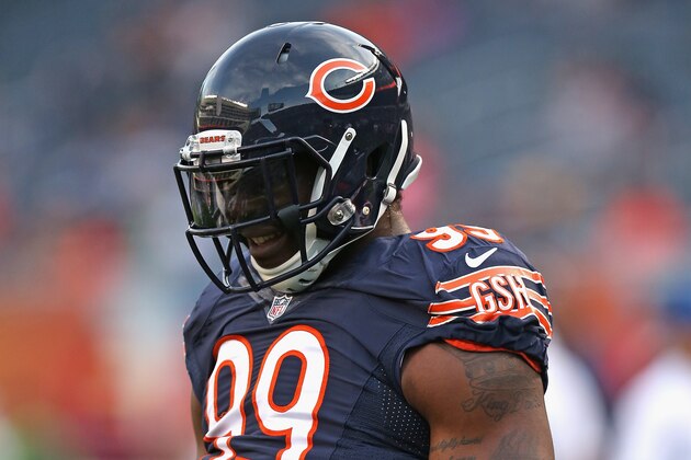 CHICAGO, IL - AUGUST 08:  Lamarr Houston #99 of the Chicago Bears participates in warm-ups before a preseason game against the Philadelphia Eagles at Soldier Field on August 8, 2014 in Chicago, Illinois. The Bears defeated the Eagles 34-28.  (Photo by Jonathan Daniel/Getty Images)