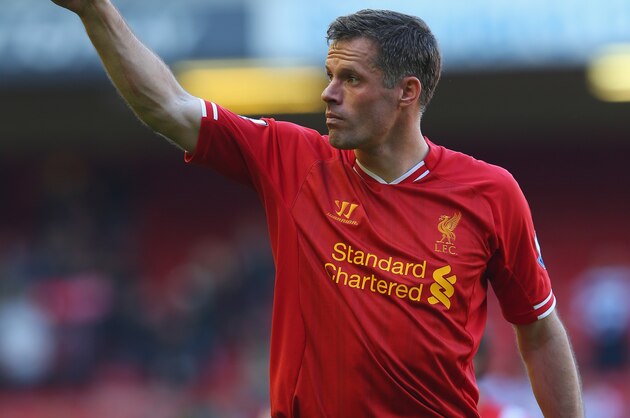 LIVERPOOL, ENGLAND - MAY 19:  Jamie Carragher of Liverpool acknowledges the fans after his last game for the club following the Barclays Premier League match between Liverpool and Queens Park Rangers at Anfield on May 19, 2013 in Liverpool, England.  (Photo by Julian Finney/Getty Images)