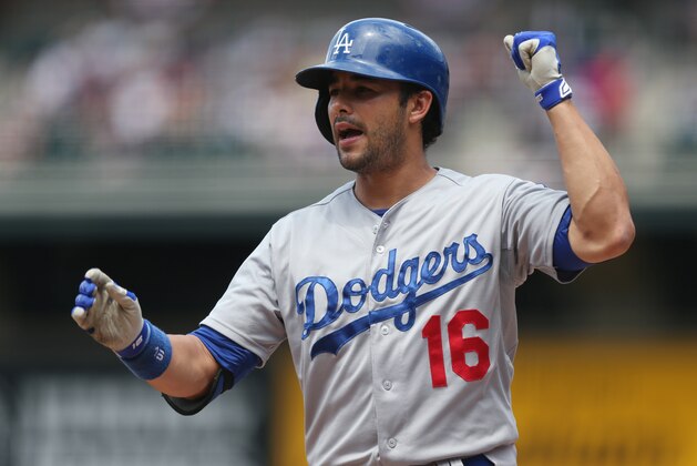 Los Angeles Dodgers' Andre Ethier reacts after striking out against the Colorado Rockies to end the top of the first inning of a baseball game in Denver on Saturday, July 5, 2014. (AP Photo/David Zalubowski)