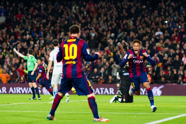 BARCELONA, SPAIN - JANUARY 11: Neymar Santos Jr (R) of FC Barcelona celebrates with his team-mate Lionel Messi after scoring the opening goal during the La Liga match between FC Barcelona and Club Atletico de Madrid at Camp Nou on January 11, 2015 in Barcelona, Spain. (Photo by Alex Caparros/Getty Images)