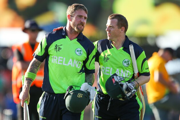 NELSON, NEW ZEALAND - FEBRUARY 16:  John Mooney (L) and Niall O'Brien of Ireland celebrate after winning the 2015 ICC Cricket World Cup match between the West Indies and Ireland at Saxton Field on February 16, 2015 in Nelson, New Zealand.  (Photo by Hagen Hopkins/Getty Images)