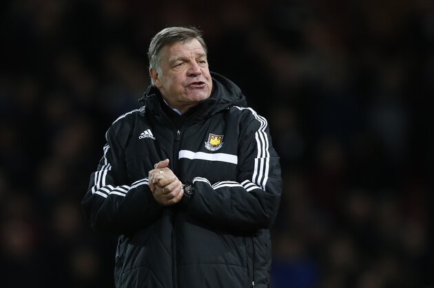 West Ham United’s manager Sam Allardyce watches his team play from the touchline during their English FA Cup third round replay soccer match between West Ham United and Everton at the Boleyn Ground stadium in London, Tuesday, Jan. 13,  2015. (AP Photo/Alastair Grant)
