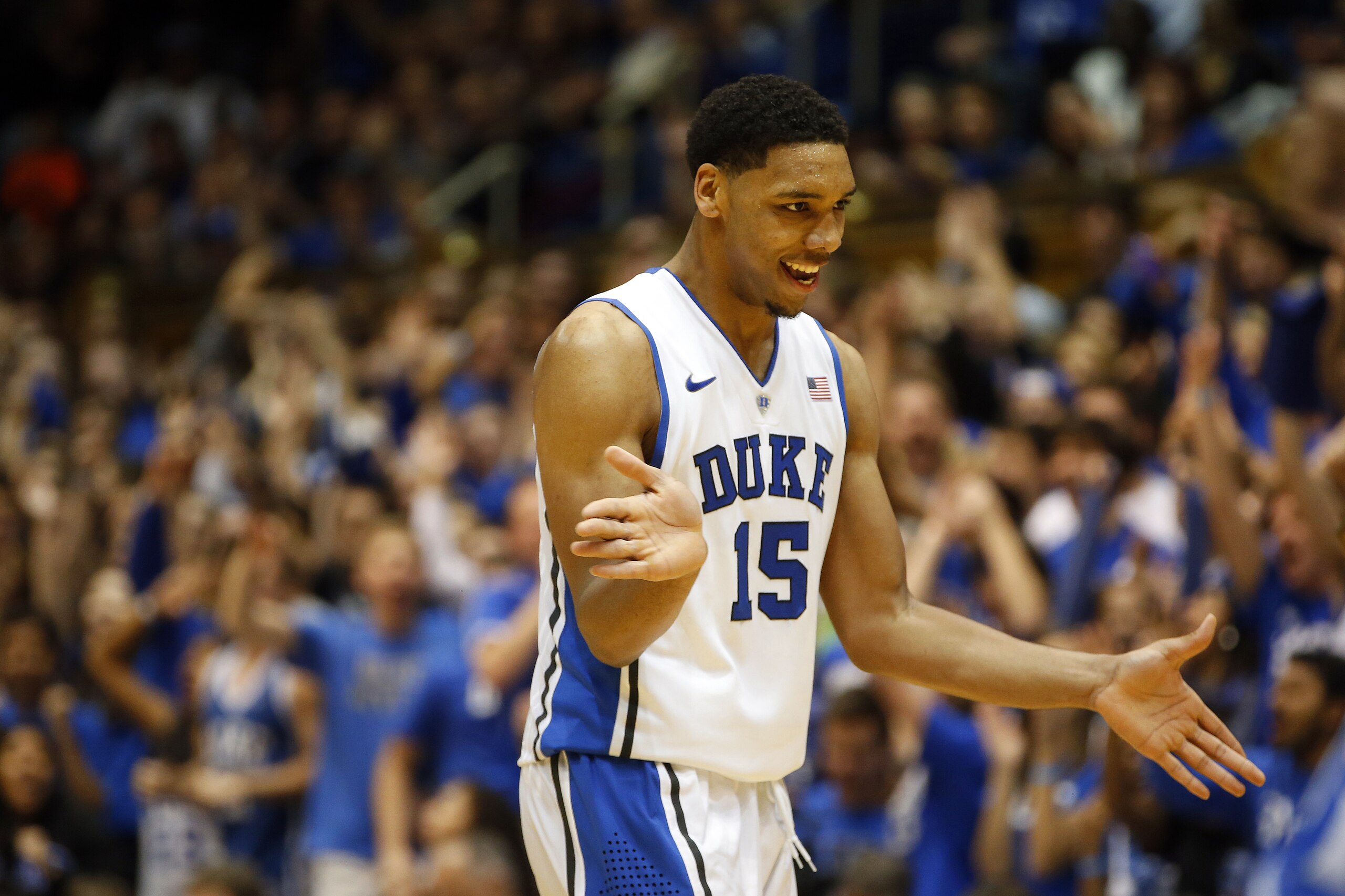 Duke's Jahlil Okafor (15) celebrates during the first half of an NCAA college basketball against the Presbyterian game in Durham, N.C., Friday, Nov. 14, 2014. (AP Photo/Karl B DeBlaker)