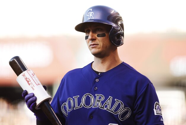 Jun 9, 2014; Denver, CO, USA; Colorado Rockies shortstop Troy Tulowitzki (2) during the first inning against the Atlanta Braves at Coors Field. Mandatory Credit: Chris Humphreys-USA TODAY Sports