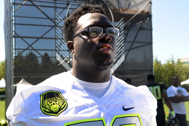 Jul 10, 2014; Beaverton, OR, USA; Offensive lineman Lester Cotton (76) goes through drills during Nike Football ' The Opening' at Nike World Headquarters.  Mandatory Credit: Steve Dykes-USA TODAY Sports