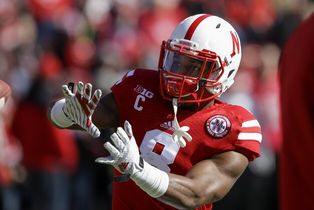 Nebraska running back Ameer Abdullah (8) makes a catch before an NCAA college football game against Purdue in Lincoln, Neb., Saturday, Nov. 1, 2014. (AP Photo/Nati Harnik)