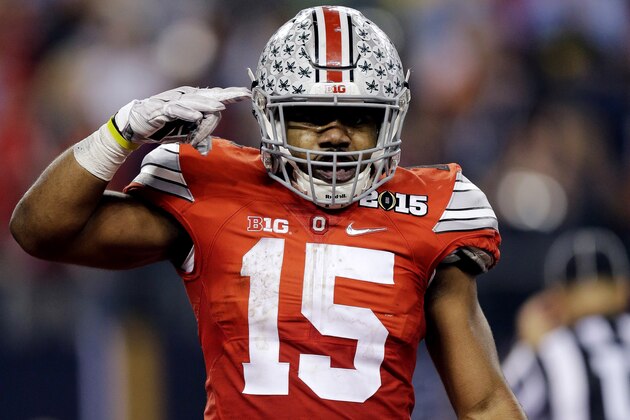 Ohio State's Ezekiel Elliott celebrates his touchdown run during the second half of the NCAA college football playoff championship game against Oregon Monday, Jan. 12, 2015, in Arlington, Texas. (AP Photo/Eric Gay)