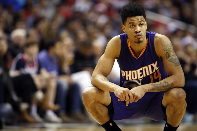 Phoenix Suns guard Gerald Green (14) pauses on the court in the first half of an NBA basketball game against the Washington Wizards, Sunday, Dec. 21, 2014, in Washington. (AP Photo/Alex Brandon)