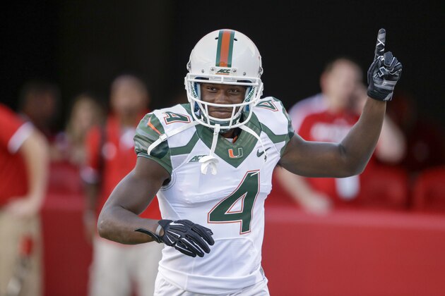 Miami wide receiver Phillip Dorsett (4) raises his hand before an NCAA college football game against Nebraska in Lincoln, Neb., Saturday, Sept. 20, 2014. (AP Photo/Nati Harnik)