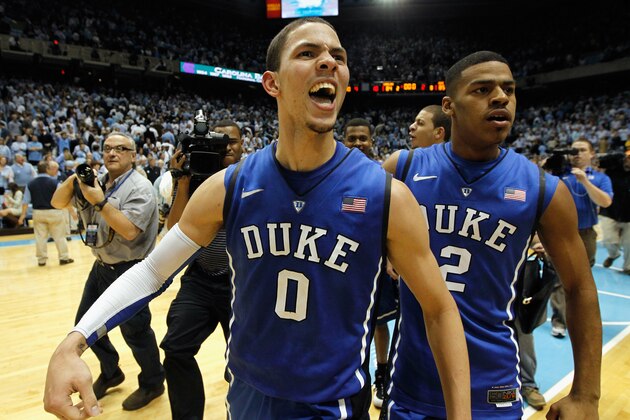 CHAPEL HILL, NC - FEBRUARY 08:  Austin Rivers #0 of the Duke Blue Devils celebrates with teammate Quinn Cook #2 after hitting a game-winning 3 pointer to defeat the North Carolina Tar Heels 85-84 during their game at the Dean Smith Center on February 8, 2012 in Chapel Hill, North Carolina.  (Photo by Streeter Lecka/Getty Images)