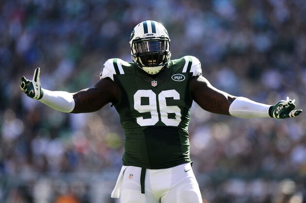 EAST RUTHERFORD, NJ - SEPTEMBER 28:   Muhammad Wilkerson #96 of the New York Jets reacts during their game against the Detroit Lions at MetLife Stadium on September 28, 2014 in East Rutherford, New Jersey.  (Photo by Ron Antonelli/Getty Images)
