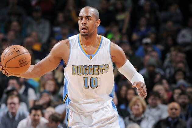 DENVER, CO-  JANUARY 17: Arron Afflalo #10 of the Denver Nuggets drives up the court against the Minnesota Timberwolves during the game on January 17, 2015 at Pepsi Center in Denver, Colorado. NOTE TO USER: User expressly acknowledges and agrees that, by downloading and or using this Photograph, user is consenting to the terms and conditions of the Getty Images License Agreement. Mandatory Copyright Notice: Copyright 2015 NBAE (Photo by Garrett Ellwood/NBAE via Getty Images)