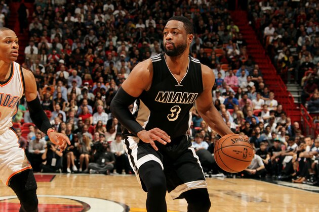 MIAMI, FL - JANUARY 20: Dwyane Wade #3 of the Miami Heat drives against the Oklahoma City Thunder on January 20, 2015 at American Airlines Arena in Miami, Florida. NOTE TO USER: User expressly acknowledges and agrees that, by downloading and or using this Photograph, user is consenting to the terms and conditions of the Getty Images License Agreement. Mandatory Copyright Notice: Copyright 2015 NBAE (Photo by Isaac Baldizon/NBAE via Getty Images)