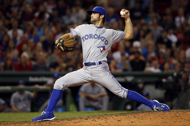 Toronto Blue Jays pitcher Daniel Norris delivers against the Boston Red Sox during the seventh inning of a baseball game at Fenway Park in Boston Friday, Sept. 5, 2014. (AP Photo/Winslow Townson)