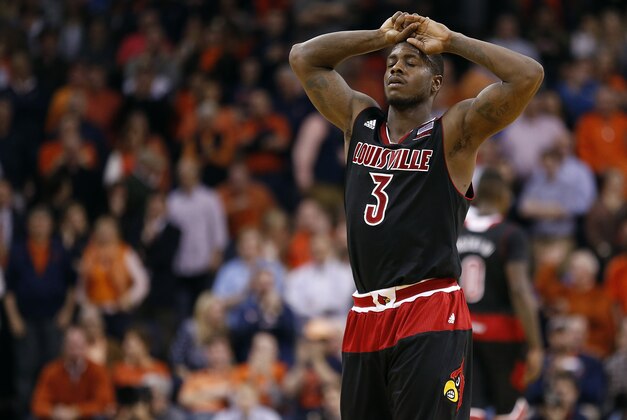 Feb 7, 2015; Charlottesville, VA, USA; Louisville Cardinals guard Chris Jones (3) reacts on the court in the closing seconds against the Virginia Cavaliers in the second half at John Paul Jones Arena. The Cavaliers won 52-47. Mandatory Credit: Geoff Burke-USA TODAY Sports