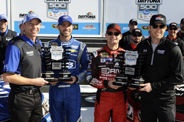 DAYTONA BEACH, FL - FEBRUARY 15:  Jeff Gordon, driver of the #24 Drive To End Hunger Chevrolet, his crew chief, Alan Gustafson, Jimmie Johnson, driver of the #48 Lowe's Chevrolet, and his crew chief, Chad Knaus, pose with the Daytona 500 Pole Award and Front Row Award after qualifying for the pole position and front row for the 57th Annual Daytona 500 at Daytona International Speedway on February 15, 2015 in Daytona Beach, Florida.  (Photo by Jared C. Tilton/Getty Images)