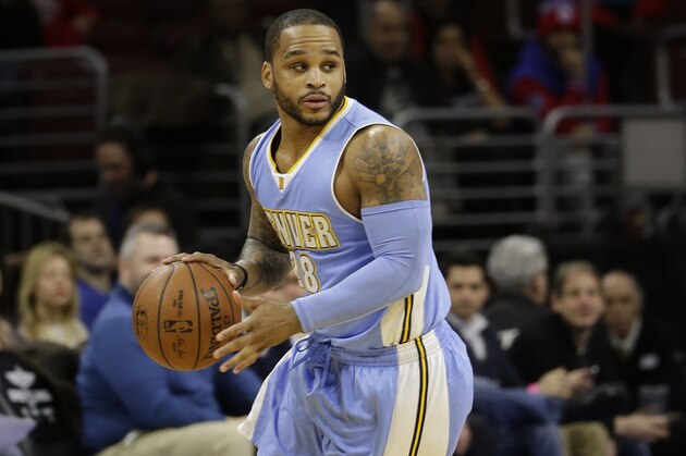 Denver Nuggets' Jameer Nelson in action during an NBA basketball game against the Philadelphia 76ers, Tuesday, Feb. 3, 2015, in Philadelphia. (AP Photo/Matt Slocum)