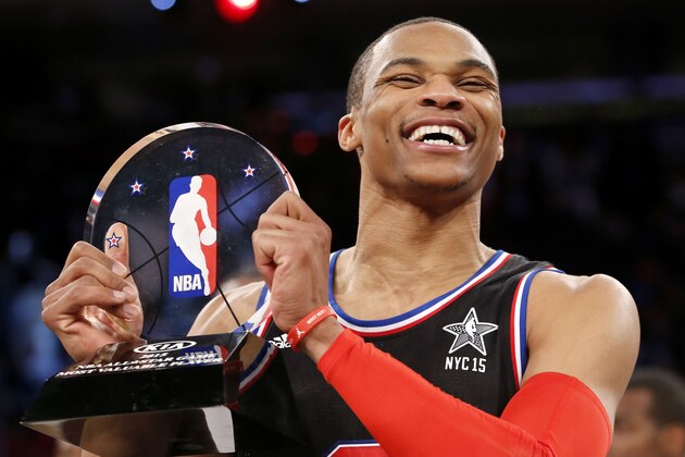 West Team’s Russell Westbrook, of the Oklahoma City Thunder, holds the MVP trophy after the NBA All-Star basketball game, Sunday, Feb. 15, 2015, in New York. The West Team won 163-158. (AP Photo/Kathy Willens)