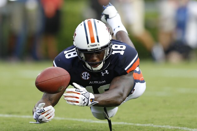 AUBURN, AL - AUGUST 30:  Wide receiver Sammy Coates #18 of the Auburn Tigers dives and just misses making a reception in the end zone during the game against the Arkansas Razorbacks at Jordan Hare Stadium on August 30, 2014 in Auburn, Alabama.  (Photo by Mike Zarrilli/Getty Images)