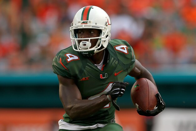 MIAMI, FL - SEPTEMBER 13: Phillip Dorsett #4 of the Miami Hurricanes rushes during a game against the Arkansas State Red Wolves at Sunlife Stadium on September 13, 2014 in Miami, Florida. (Photo by Mike Ehrmann/Getty Images) MIAMI, FL - SEPTEMBER 13: Phillip Dorsett #4 of the Miami Hurricanes rushes during a game against the Arkansas State Red Wolves at Sunlife Stadium on September 13, 2014 in Miami, Florida. (Photo by Mike Ehrmann/Getty Images)