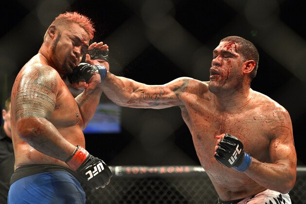 BRISBANE, AUSTRALIA - DECEMBER 07:  Antonio 'Big Foot' Silva of Brazil connects with a punch during the UFC Brisbane bout between Mark Hunt and Antonio 'Big Foot' Silva of Brazil at the Brisbane Entertainment Centre on December 7, 2013 in Brisbane, Australia.  (Photo by Bradley Kanaris/Getty Images)